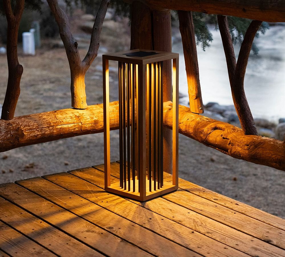 Rustic solar lantern glowing at sunset