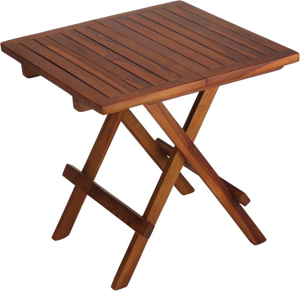 Compact folding table made of solid teak wood with slatted top and crossed legs