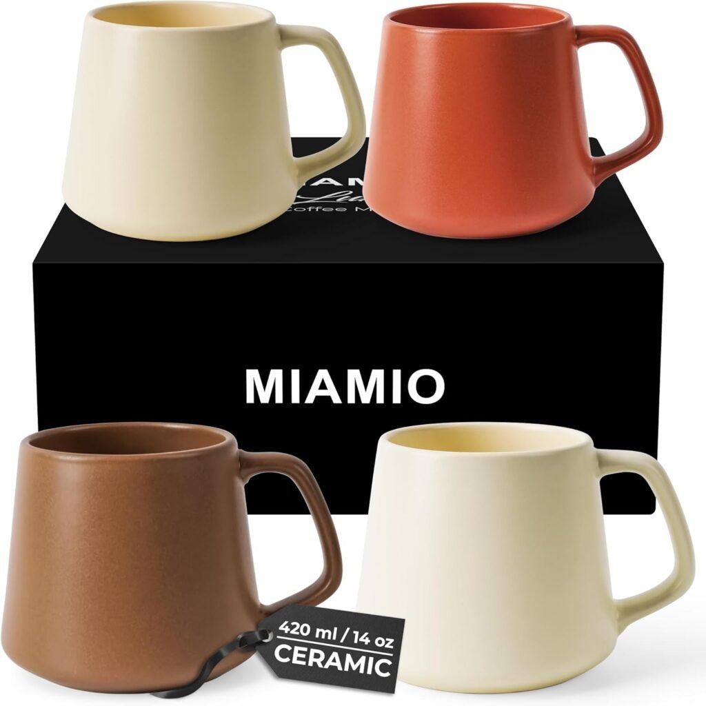 Set of four matte finish mugs in warm, earthy colors