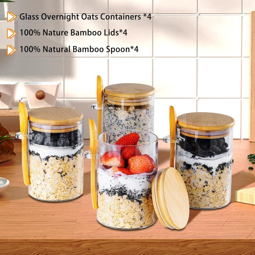 Four glass jars with oats and fruits for breakfast prep