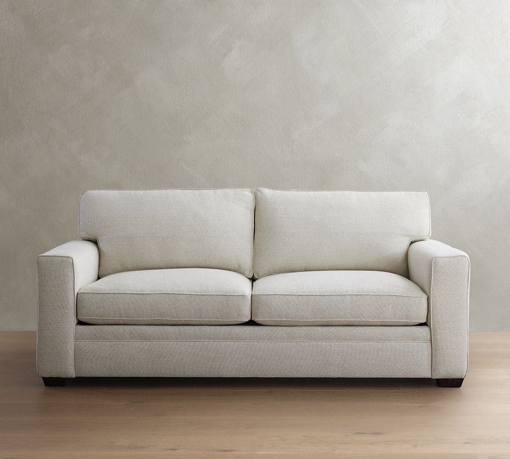 Neutral-toned square arm sofa with plush cushions