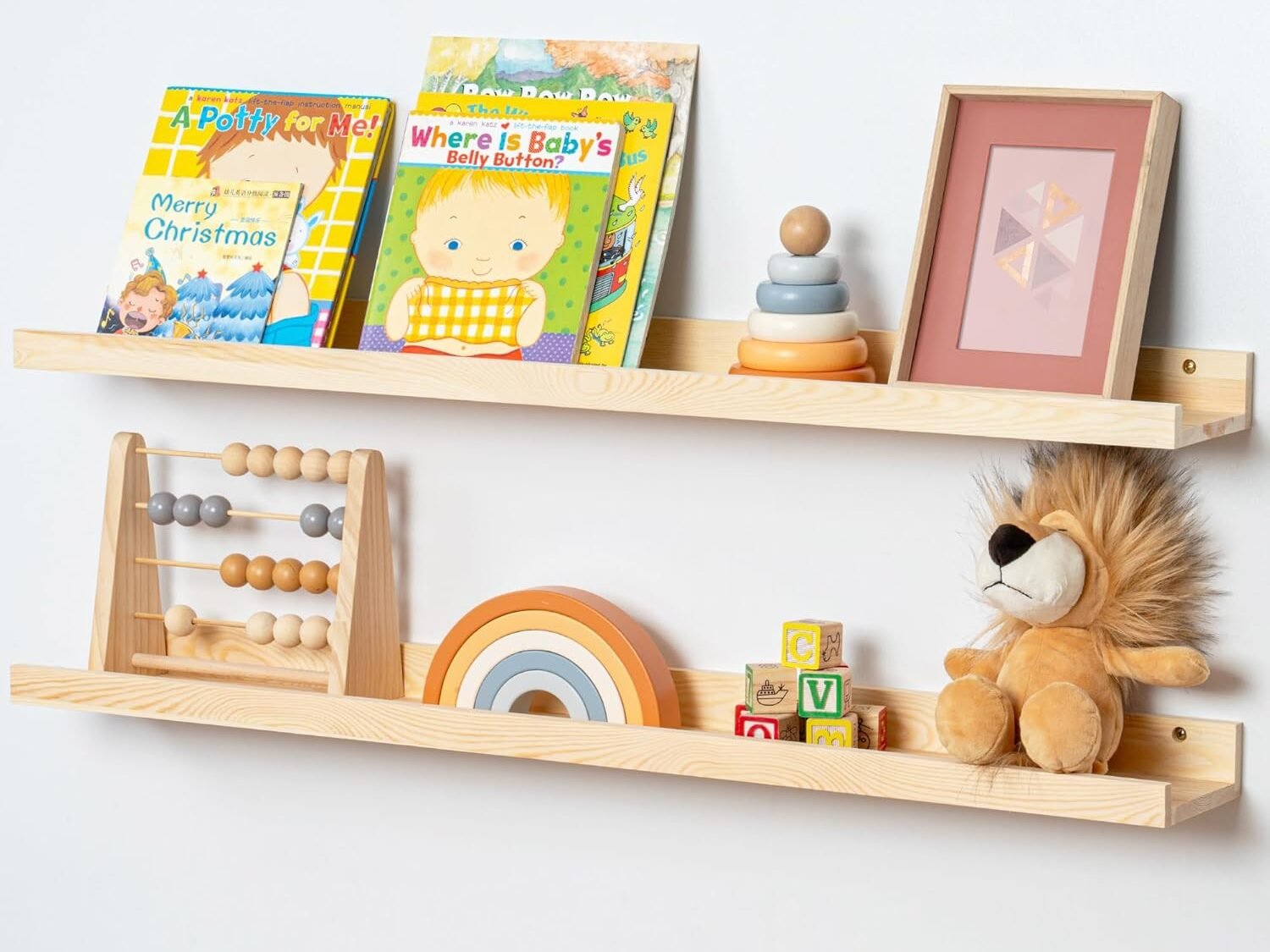 Solid pine wall-mounted picture ledge with books and toys