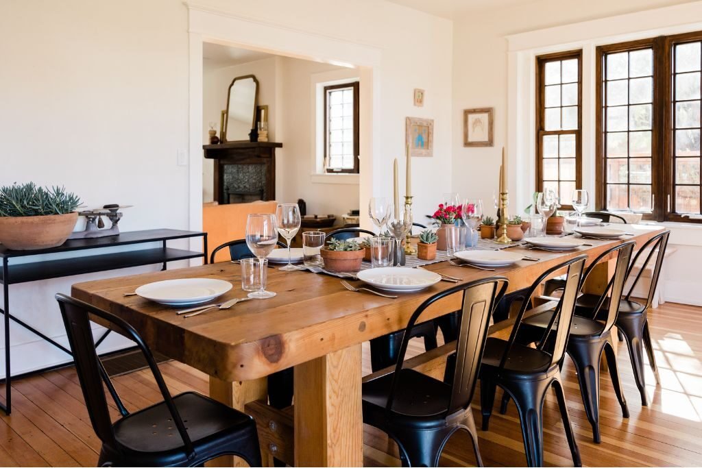 Full dining set featuring solid pine table and chairs in rustic setting