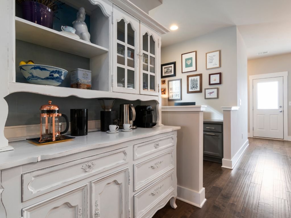 Coffee prep nook built into white cabinetry