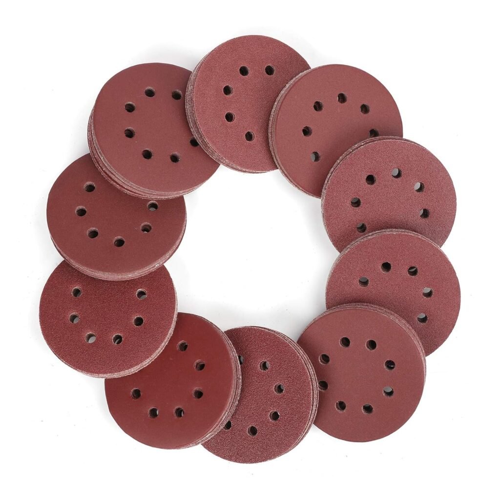 Set of round red sanding discs in various grits