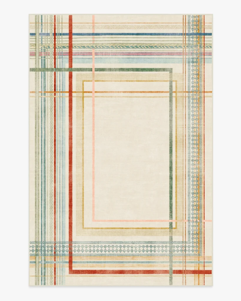Colorful striped outdoor rug in cream backdrop