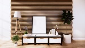 Minimalist living room with vertical wood slat accent wall and plants