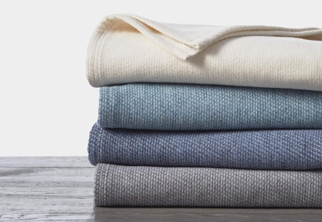 Folded organic cotton throw in blue